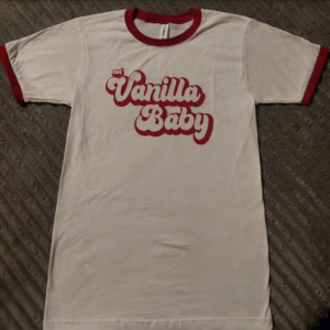 T-shirt laying flat for display. Says "not vanilla baby"